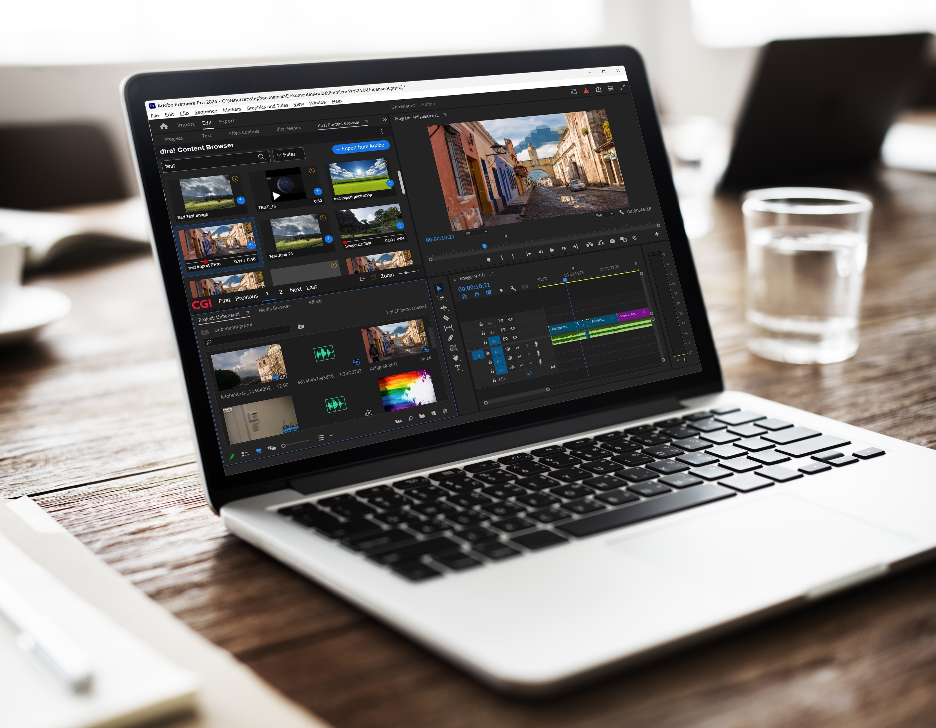 Laptop showing dira integration with Adobe