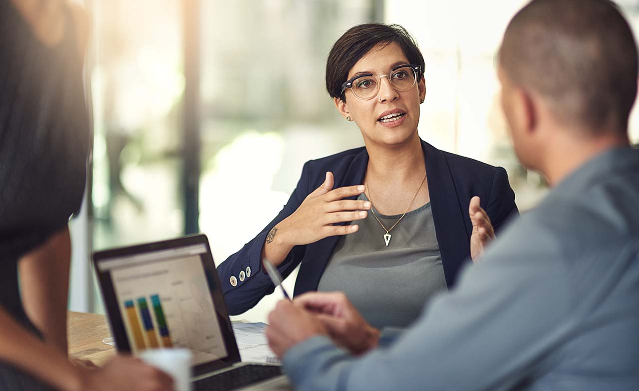 Executives talking during meeting