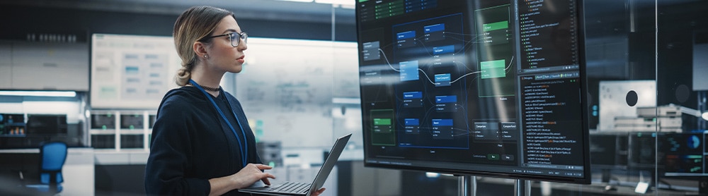 AI developer using Artificial Intelligence software on a computer