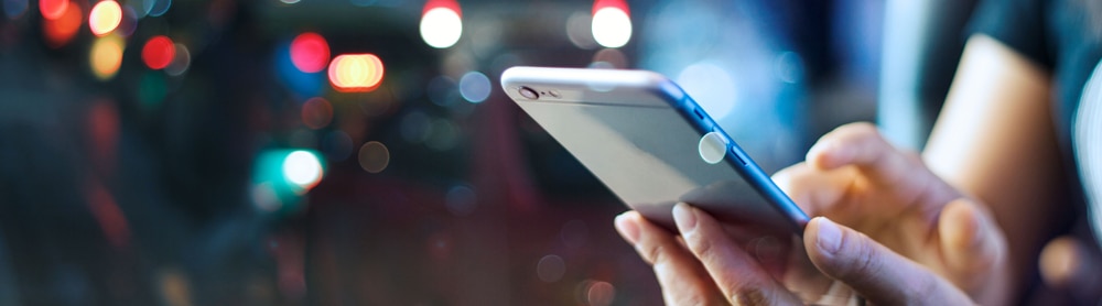 Hands holding a mobile phone