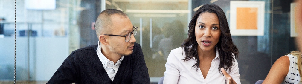 Consultants discussing assessment results