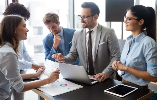 colleagues working together at table