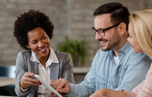 Consultant discussing with two clients