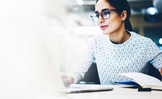 Woman looking at computer