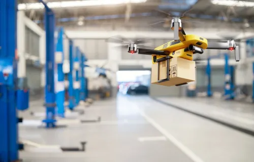 drone moving package on warehouse floor