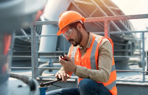 engineer checking industry cooling tower air conditioner