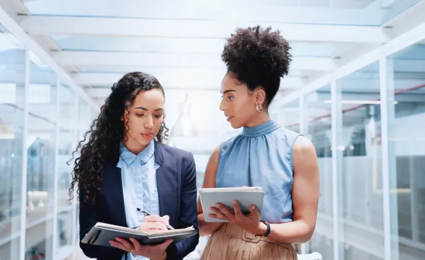 Engineers discussing transformational approach to managed services