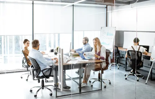 group of developers working at a table