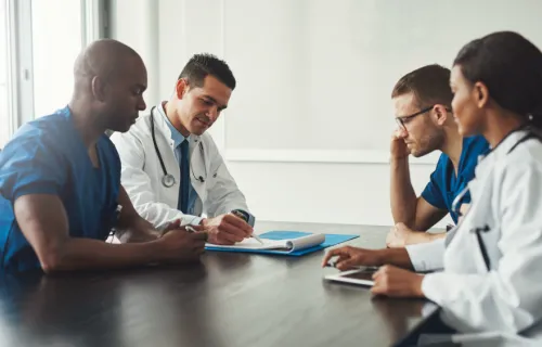 health clinicians at conference table