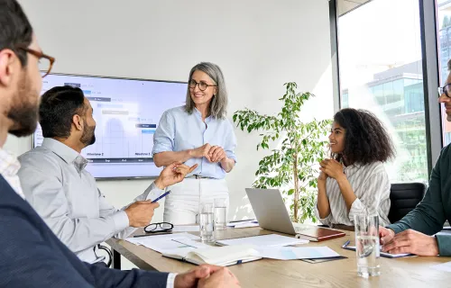 Woman in discussion with her collegues