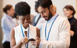 man and woman at business conference