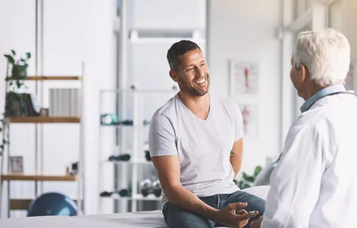 patient speaking with clinician