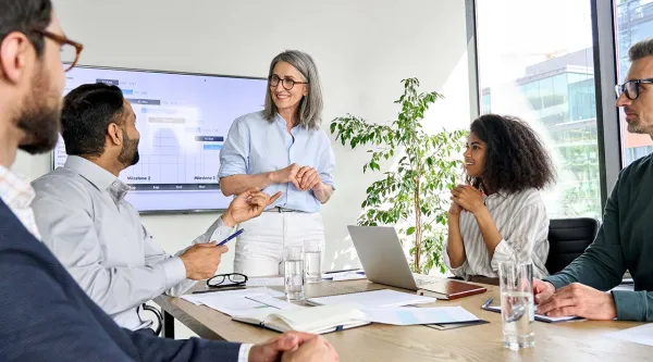 Artificial intelligence workshop team meeting discussing project results