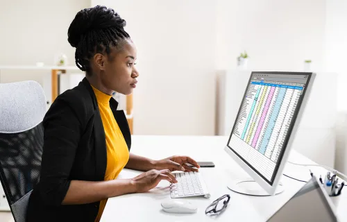 person sitting working on computer