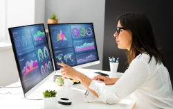 woman working with data on a computer